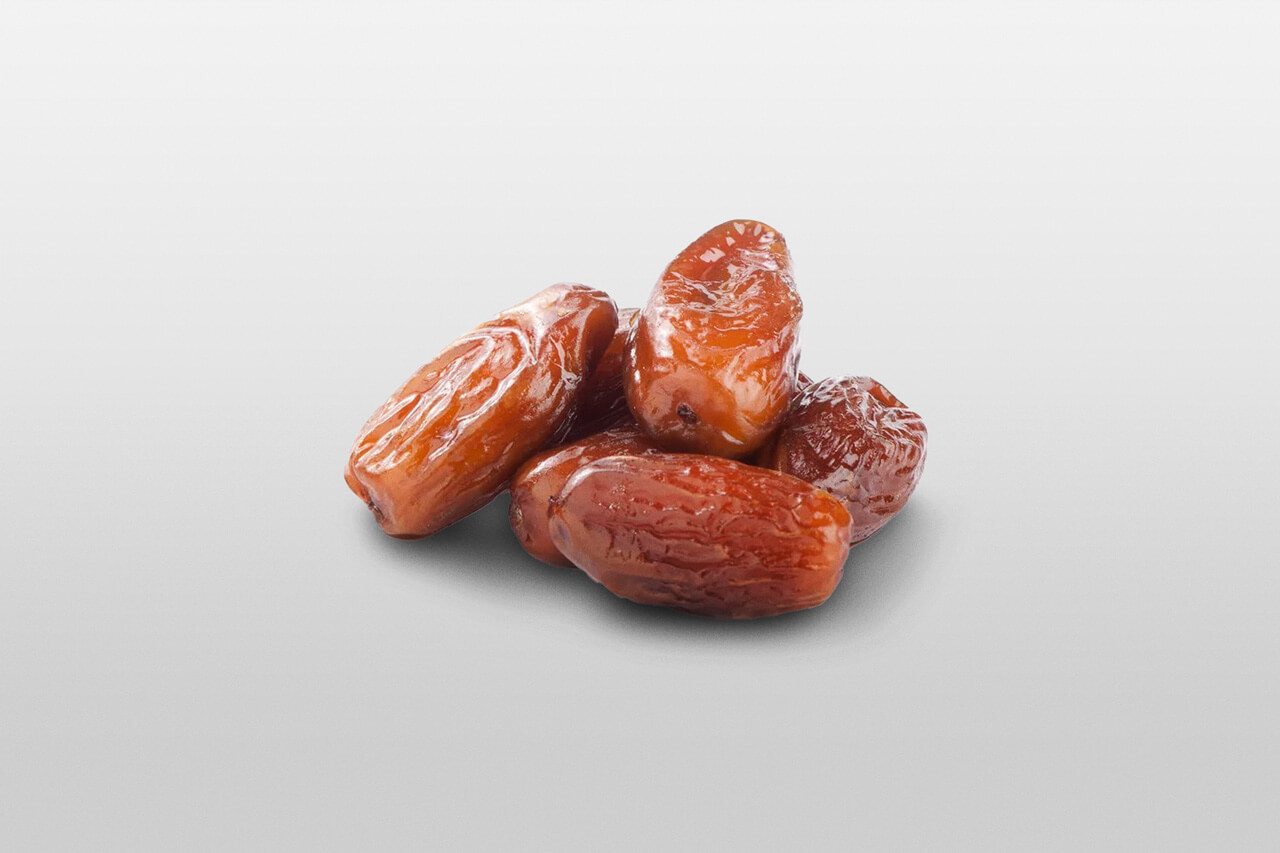 Datteln auf grauem Hintergrund